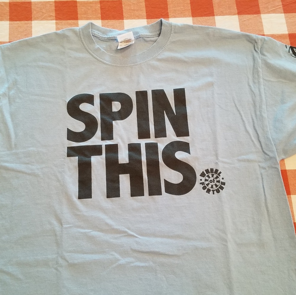 Wheel of Fortune Spin This light blue t-shirt size XL funny saying graphic tee